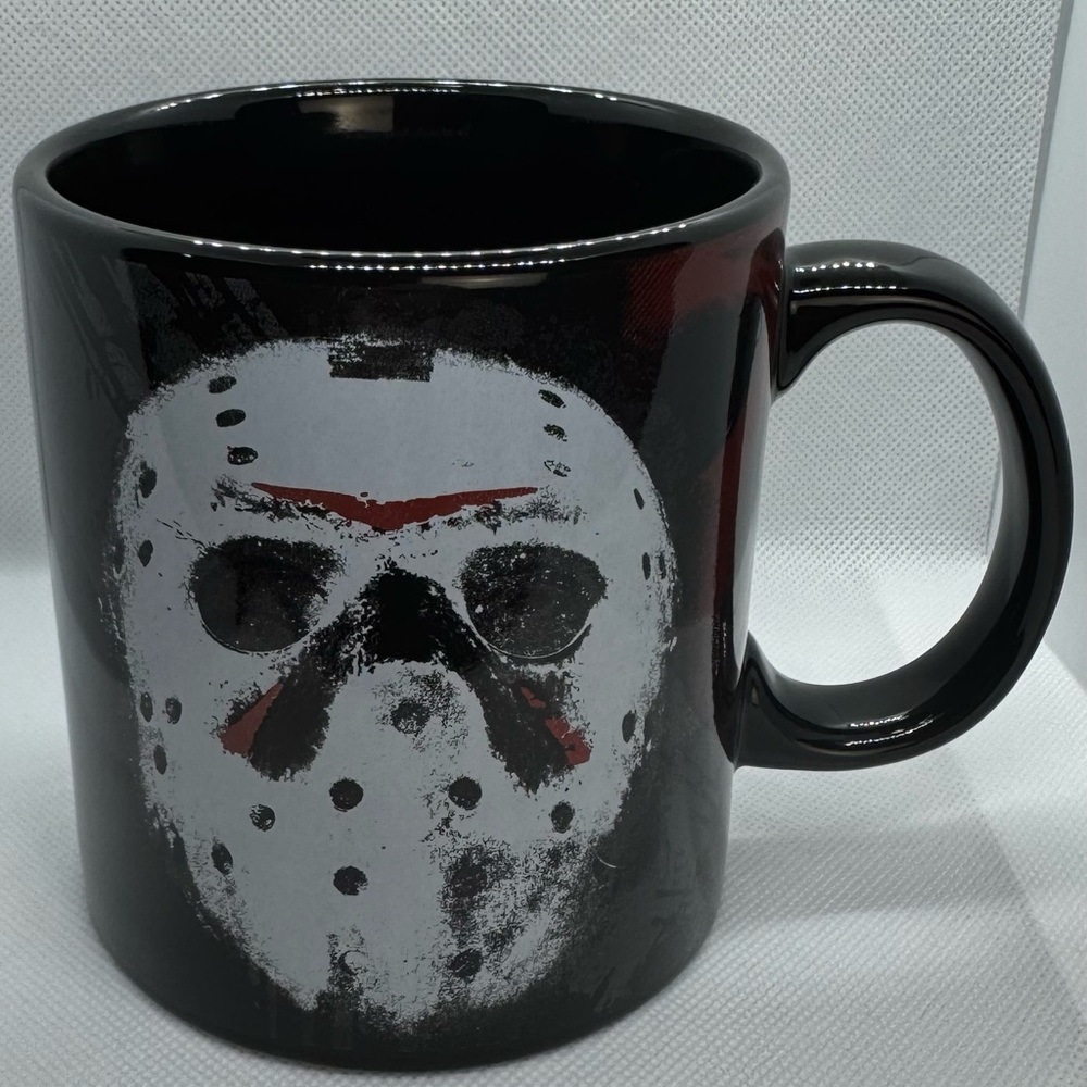 Black Mug with White and Red Mask Design